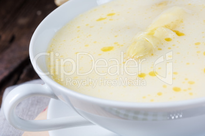 rustic white asparagus cream soup with butter