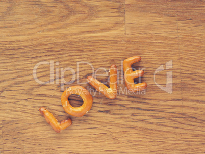 The word love on a wooden table