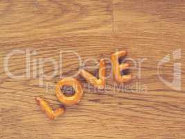 The word love on a wooden table