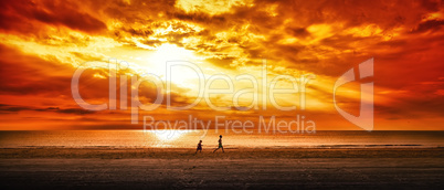 children running on a beach