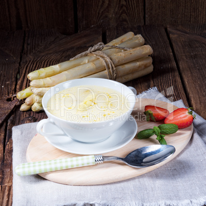 rustic white asparagus cream soup with butter