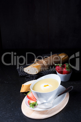 asparagus soup with poached egg and fresh baguettes