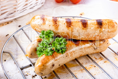 delicious bratwurst with ketchup and fresh rolls