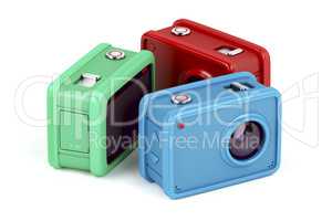Three action cameras on white