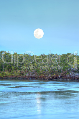 Moonrise over River leading to the ocean at Clam Pass