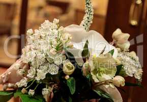 Bouquet of white flowers including roses