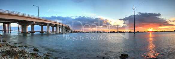 Sunset over the bridge roadway that journeys onto Marco Island,