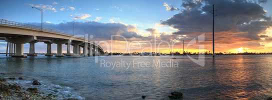 Sunset over the bridge roadway that journeys onto Marco Island,