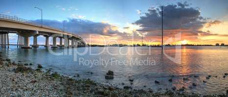 Sunset over the bridge roadway that journeys onto Marco Island,