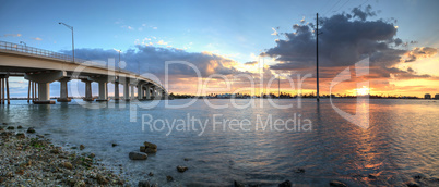 Sunset over the bridge roadway that journeys onto Marco Island,