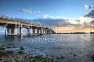 Sunset over the bridge roadway that journeys onto Marco Island,