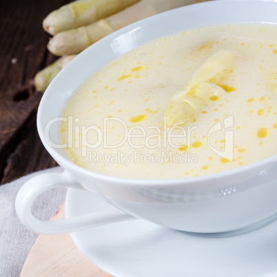 rustic white asparagus cream soup with butter