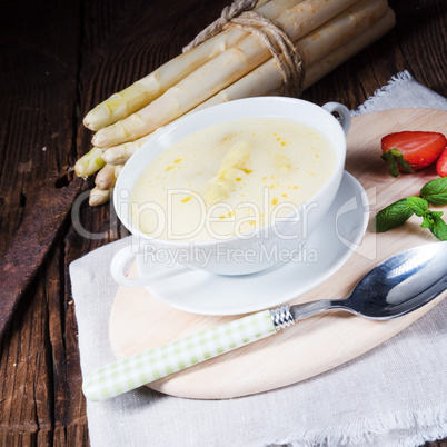 rustic white asparagus cream soup with butter