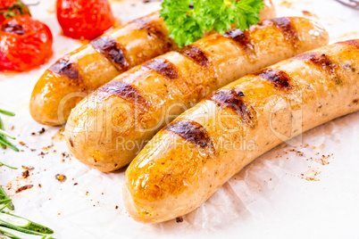 delicious bratwurst with ketchup and fresh rolls