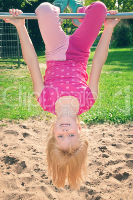 girl hanging upside down