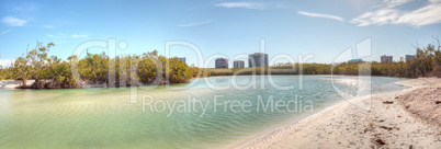 White sand beach and aqua blue water of Clam Pass in Naples, Flo