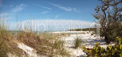 White sand beach and aqua blue water of Clam Pass in Naples, Flo