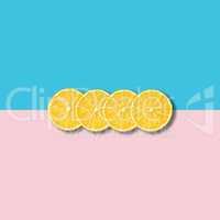 Minimal abstract illustration with group of lemon slices on past