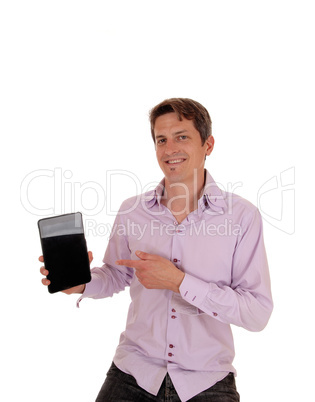 Young man pointing at his tablet screen