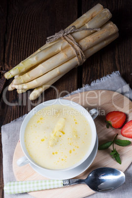 rustic white asparagus cream soup with butter