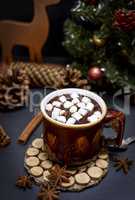 mug with hot chocolate and small white marshmallow slices