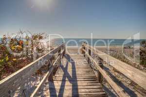 Boardwalk across the white sand beach of Delnor-Wiggins Pass Sta