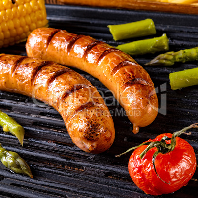 grilled krakauer with french fries and green salad