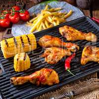 Rustic Grilled chicken wings,legs,and spicy corn