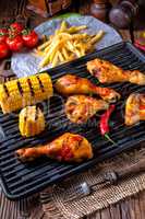 Rustic Grilled chicken wings,legs,and spicy corn