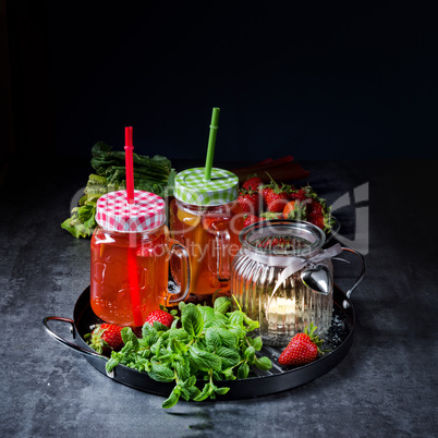 a fruit lemonade with strawberries rhubarb and mint