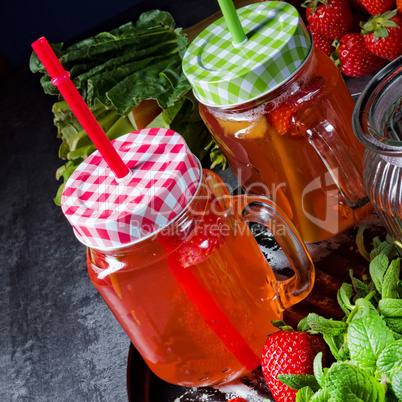 a fruit lemonade with strawberries rhubarb and mint