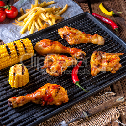 Rustic Grilled chicken wings,legs,and spicy corn