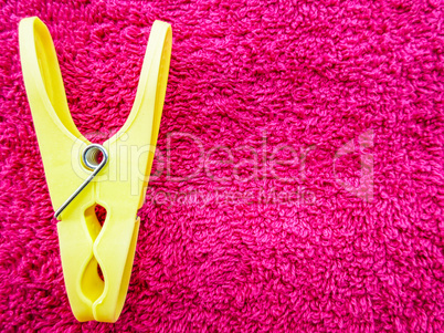 Yellow plastic clip.