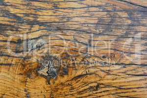 Wooden background with knots and cracks