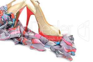 Elegant sandals and scarf isolated on white background.