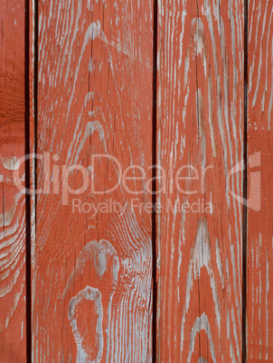 Detail of wooden fence with peeling paint