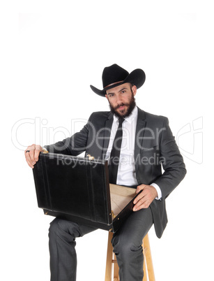 Business man looking in his briefcase