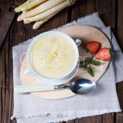 rustic white asparagus cream soup with butter