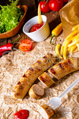 rustic bratwurst with pommes and hot ketchup