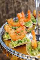 snack of avocado with shrimp