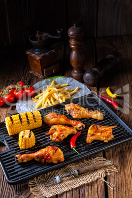 Rustic Grilled chicken wings,legs,and spicy corn