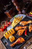 Rustic Grilled chicken wings,legs,and spicy corn