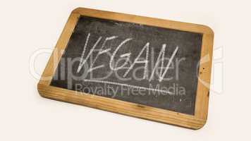 vegan writing on blackboard