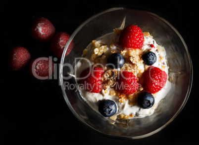 Yogurt bowl with raspberries.