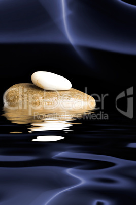 Stones with reflection in water