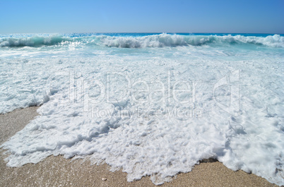 Powerful vawes and sea foam