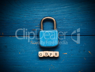 GDPR concept image on rustic blue wood