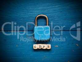 GDPR concept image on rustic blue wood