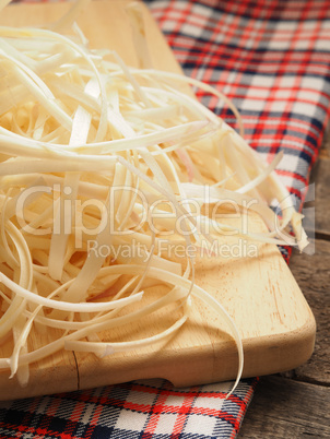 Asparagus peels on a cutting board