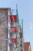 Building with a scaffolding